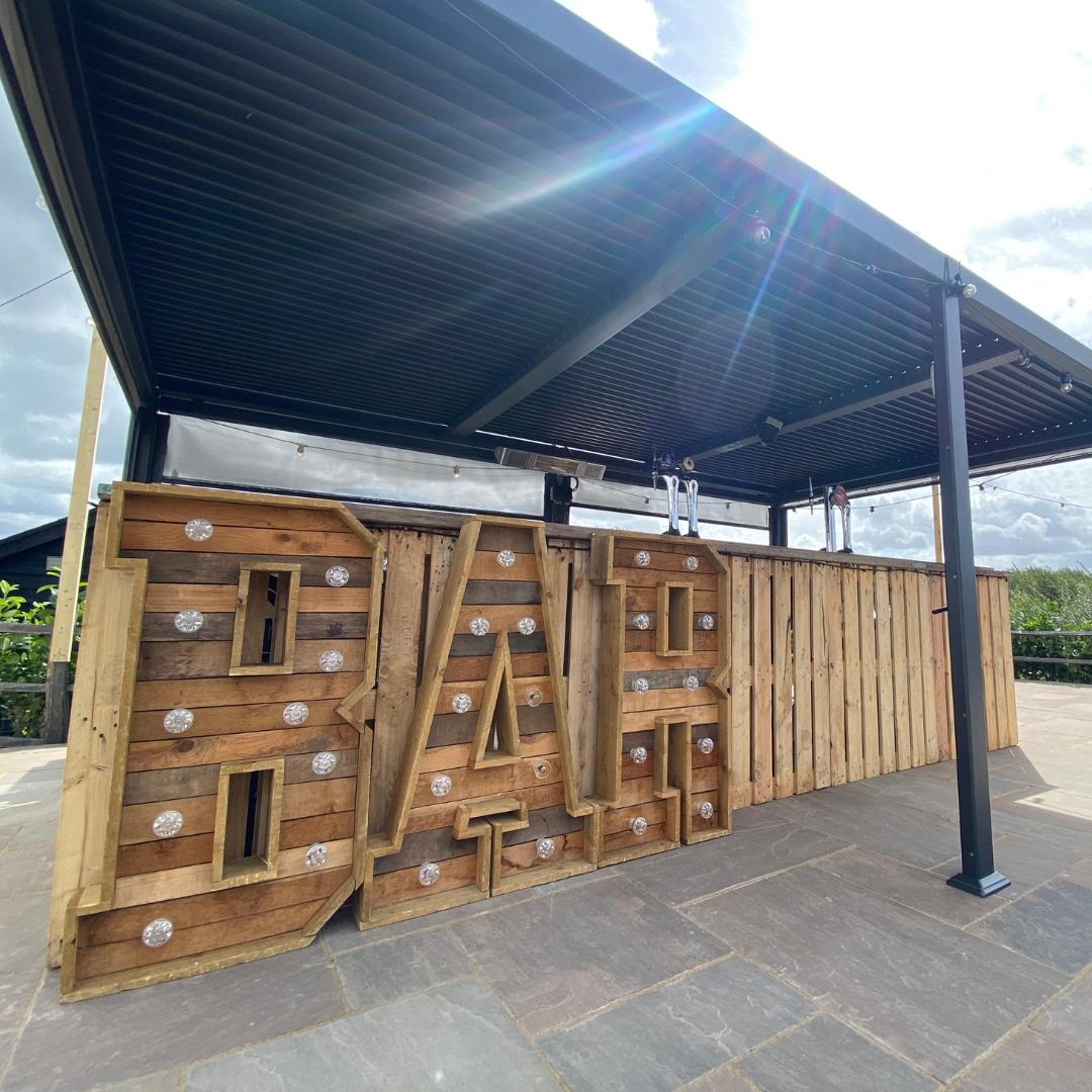 Hire the Barman wooden BAR marquee letters dressed at a private wedding reception